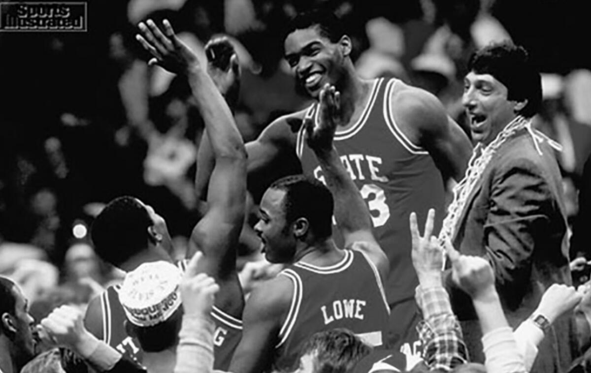 NC State "Wolfpack" basketball team celebrating their 1983 NCAA Championship win